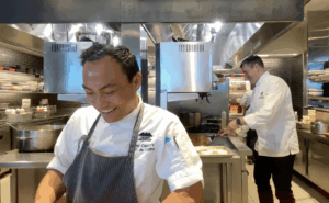 Two chefs in the kitchen at Desert Mountain preparing meals for restaurant week