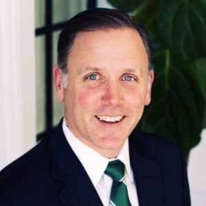 headshot of andy fisher, the new director of golf at desert mountain club in scottsdale arizona