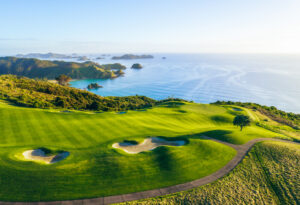 shot of one the holes at Kauri Cliffs, a course Members were able to play at through an international travel adventure at desert mountain club